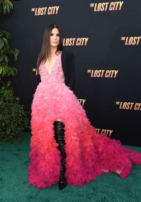 sandra bullock leather|Sandra Bullock, 57, dons plunging pink ombré gown。